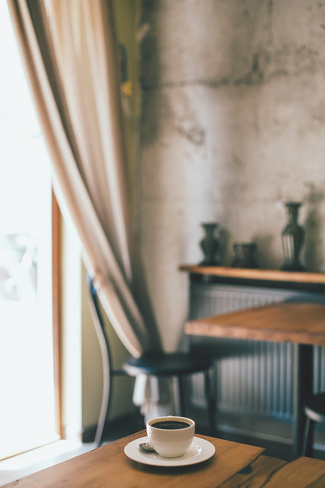old wooden table with coffee cup