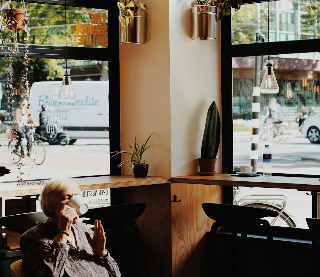 elderly couple drinking coffee