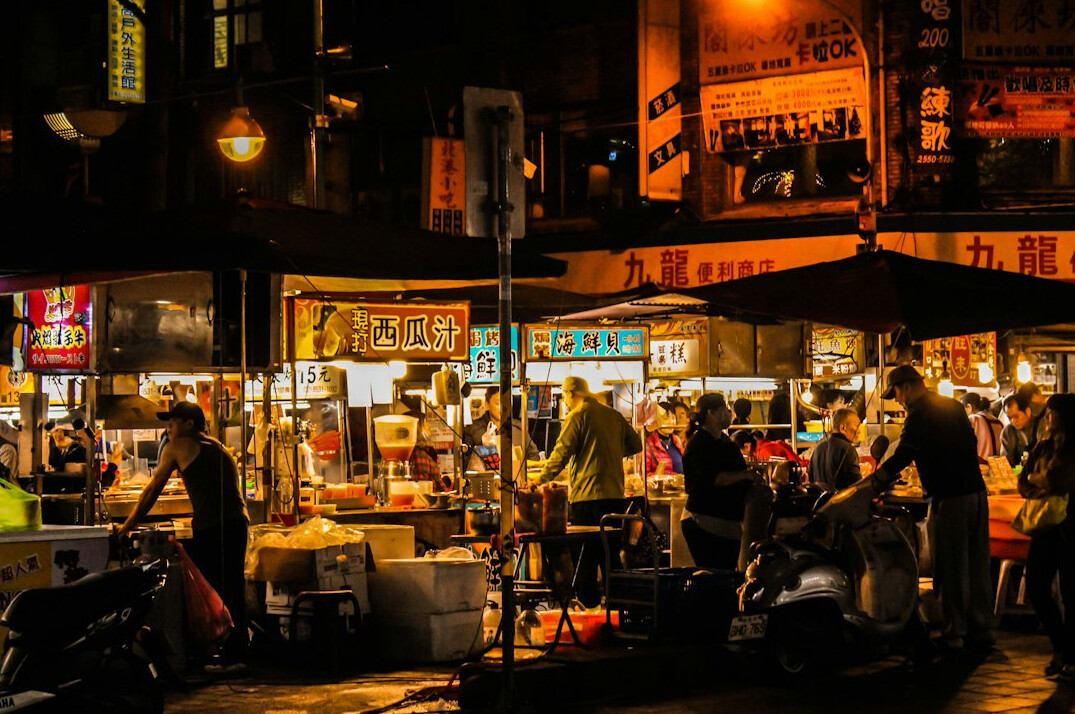 Busy street market stall with fresh produce in a Chilean neighborhood